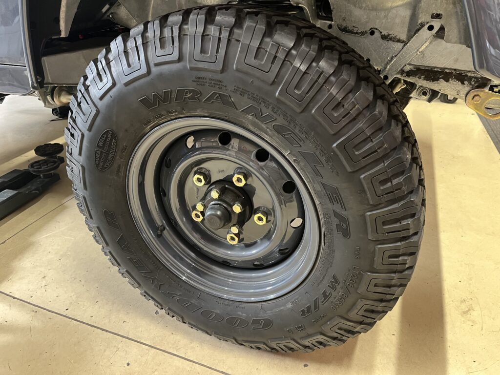 Wolf steel wheel with plated wheel nuts on the Ninety