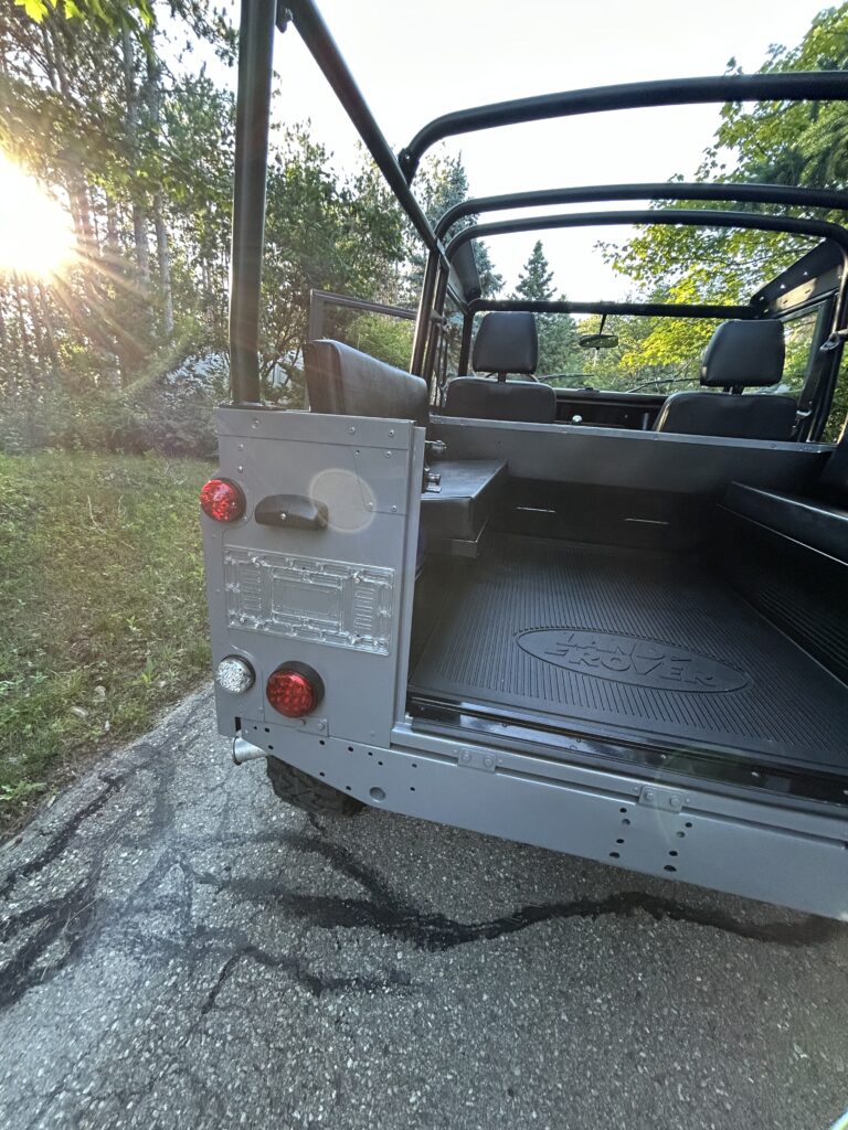 Rear view of The Nazaré with heavy-duty roll bars over the open tub