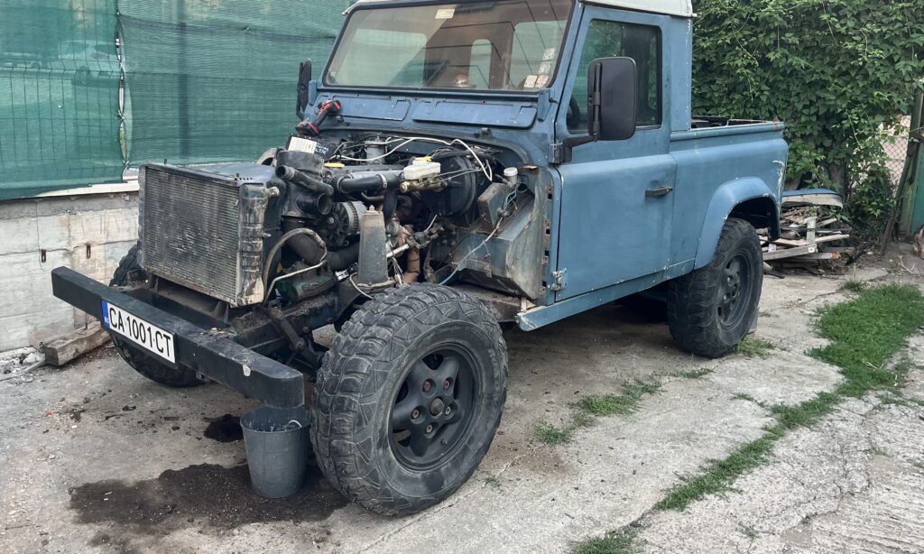 Barry with its front wings and grille removed at the start of the teardown