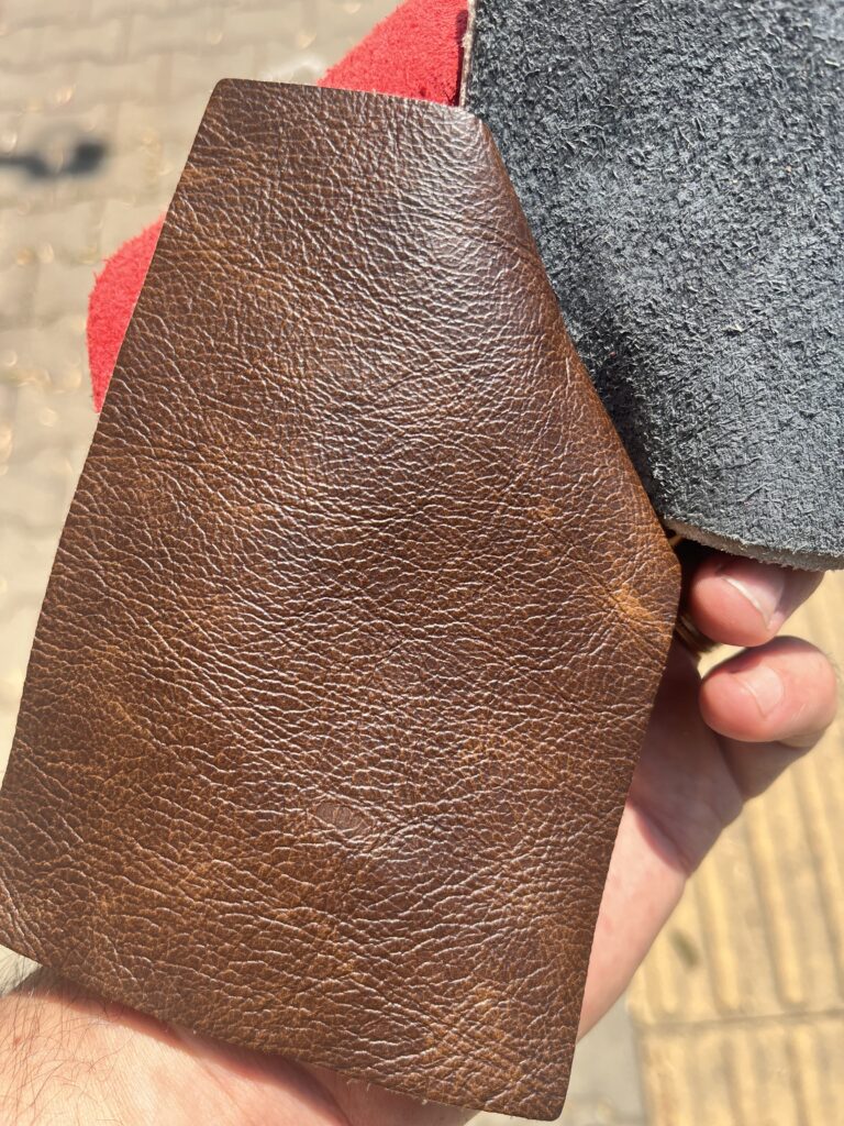A sample of the distressed brown leather chosen for the Ninety's seats